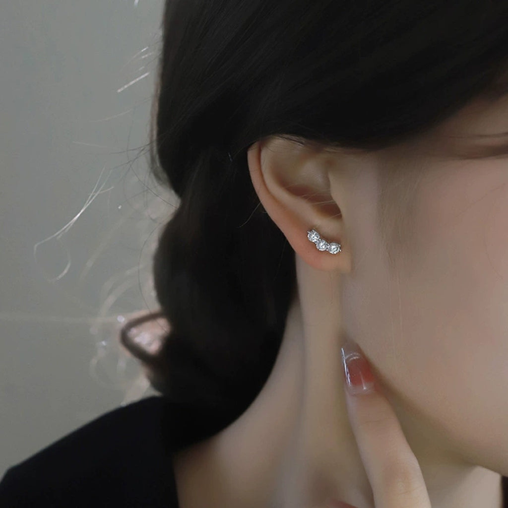 Smile Graduated Round Moissanite Ear Climber Stud Earrings in Gold-Plated S925 sterling silver worn on ear by model showing scale, placement, and ear climber stud earrings styling