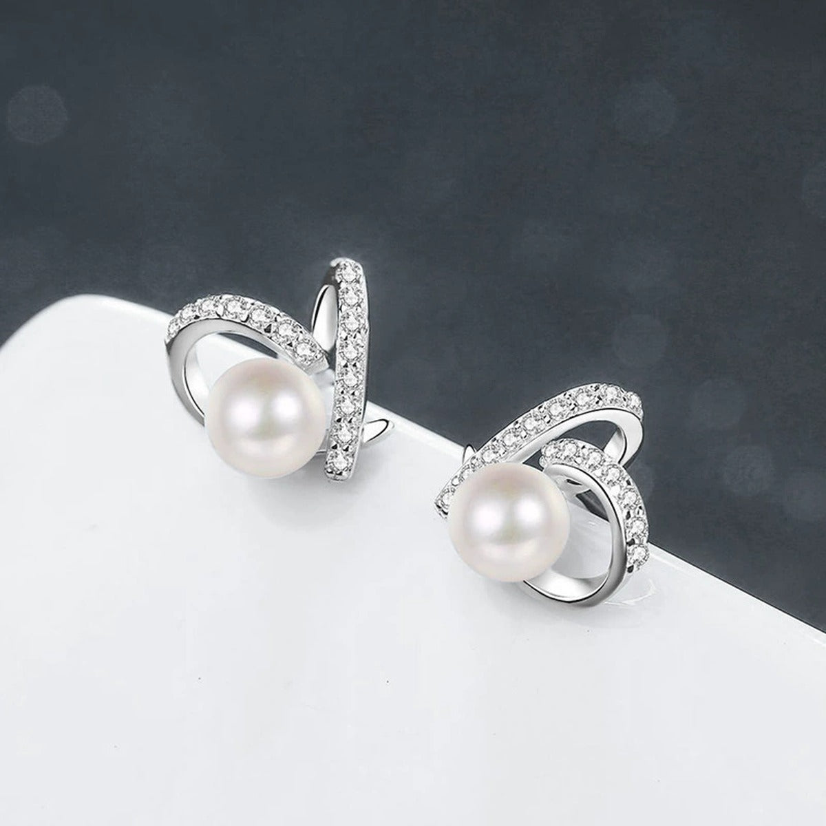 Heart Pearl Moissanite Stud Earrings in White Gold-Plated S925 sterling silver product scene view showing angled setting detail