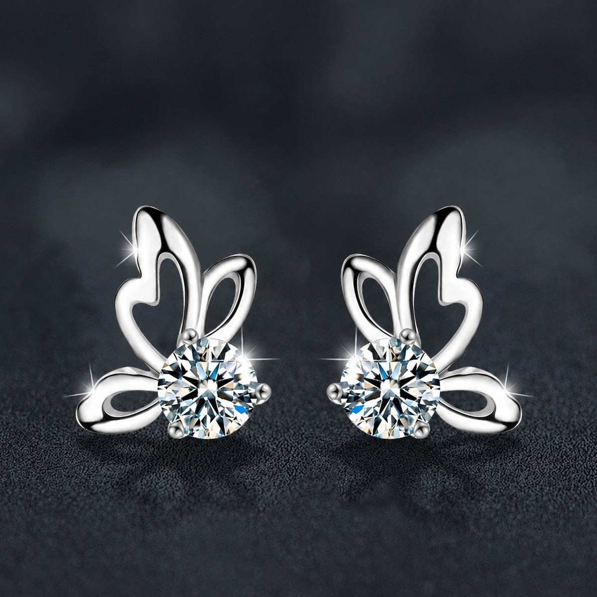 Butterfly Round Moissanite Stud Earrings in White Gold-Plated S925 sterling silver product scene view showing front sparkle
