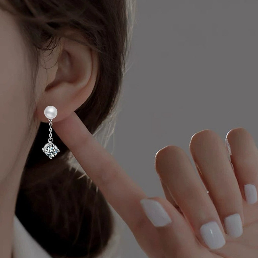 Pearl Round Moissanite Stud Dangle Earrings in White Gold-Plated S925 sterling silver worn on ear by model showing scale, placement, and stud dangle earrings styling