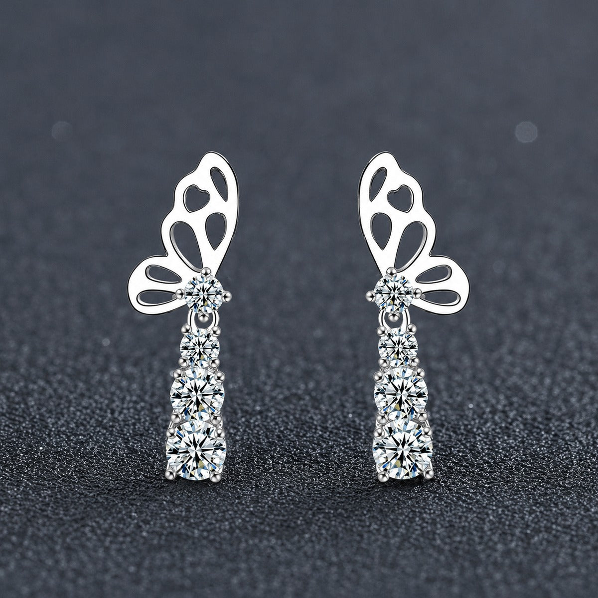 Butterfly Graduated Round Moissanite Stud Dangle Earrings in Gold-Plated S925 sterling silver product scene view showing angled setting detail