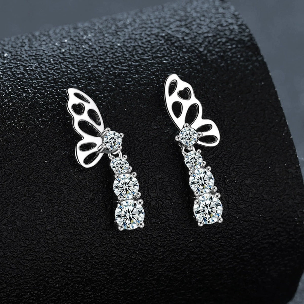 Butterfly Graduated Round Moissanite Stud Dangle Earrings in Gold-Plated S925 sterling silver product scene view showing side profile