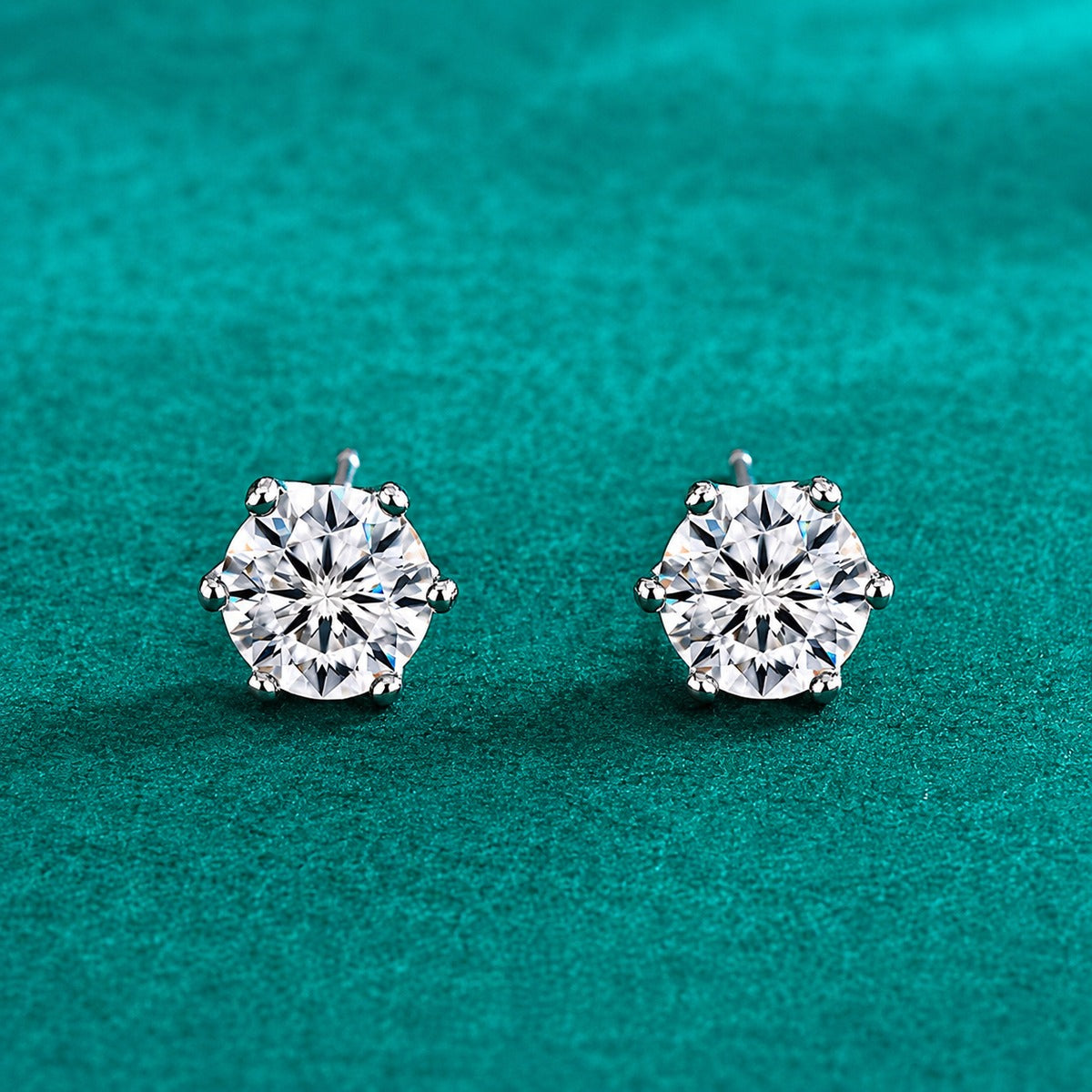 Four-Prong Round Moissanite Solitaire Stud Earrings in Gold-Plated S925 sterling silver product scene view showing angled setting detail