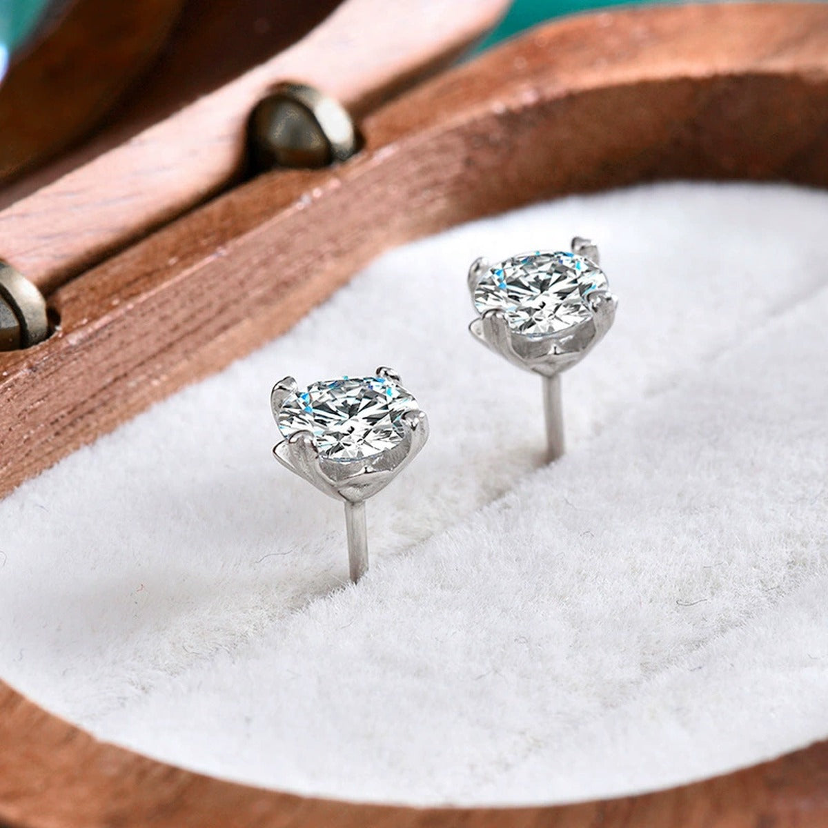 Four-Prong Round Moissanite Solitaire Stud Earrings in Gold-Plated S925 sterling silver product scene view showing side profile