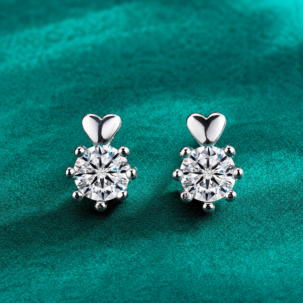 Heart Accent Round Moissanite Stud Earrings in Gold-Plated S925 sterling silver product scene view showing angled setting detail
