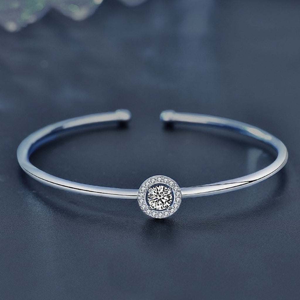 Round Halo Moissanite Adjustable Bangle with CZ in White Gold-Plated S925 sterling silver angled product display showing bracelet silhouette