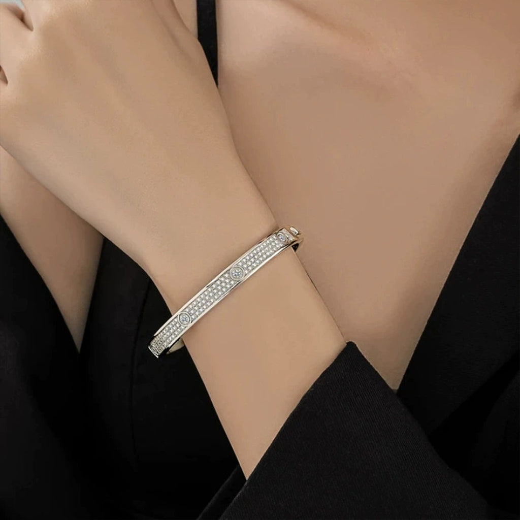 Round Moissanite Eternity Bangle in Gold-Plated S925 sterling silver worn on wrist model view showing scale and adjustable fit