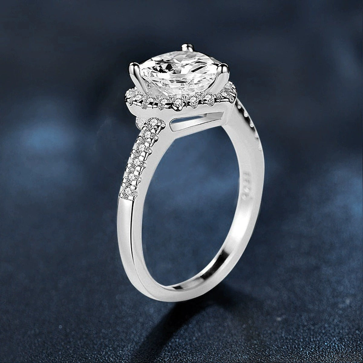 Heart Halo Round Moissanite Engagement Ring with CZ close-up detail view with moissanite sparkle
