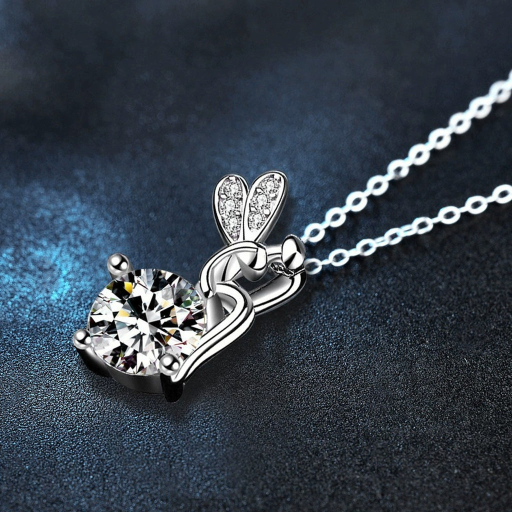 Flower Fairy Round Moissanite Necklace with CZ in White Gold-Plated S925 sterling silver blue display scene showing flower fairy floral pendant, round moissanite center, and CZ accents