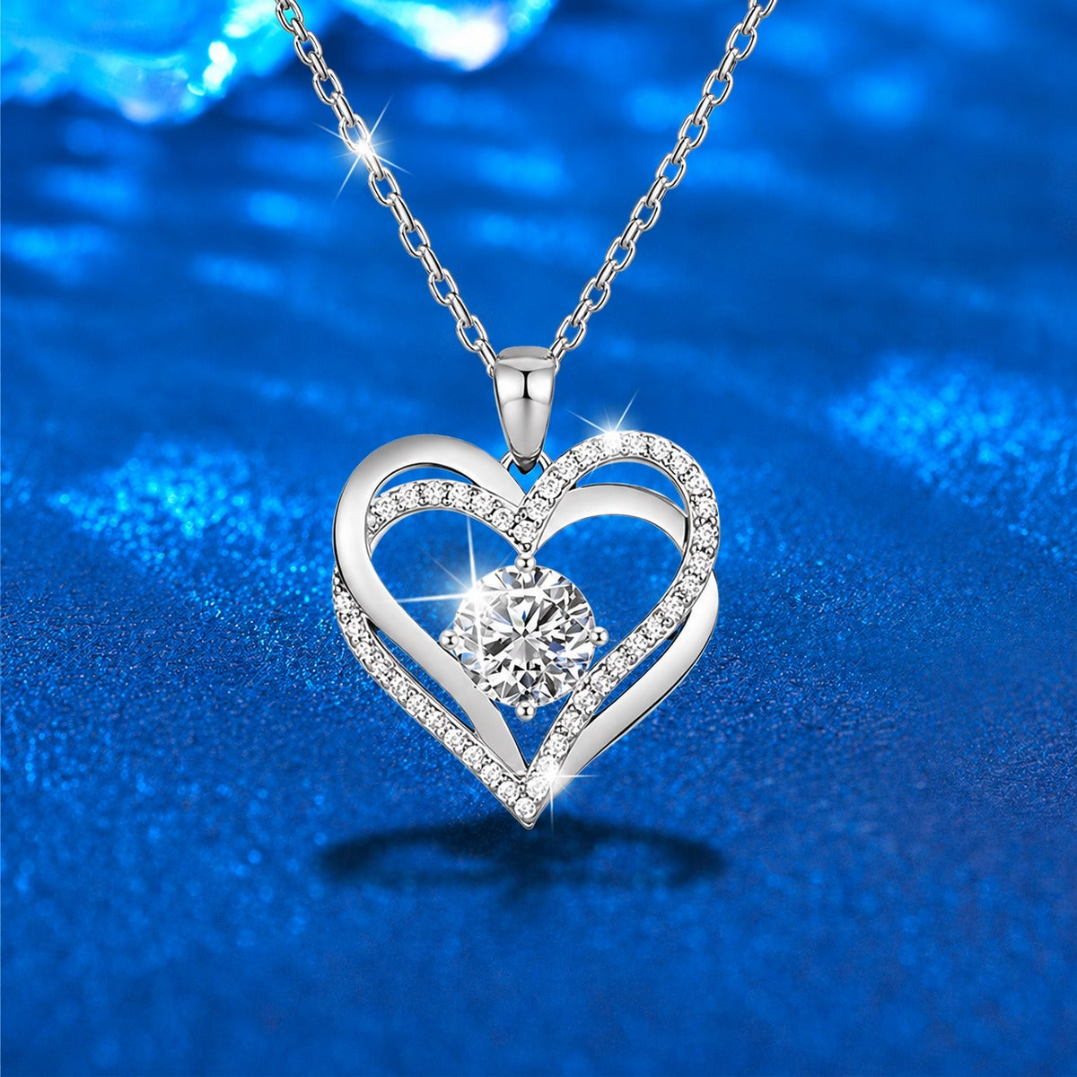 Interlocking Heart Colored Moissanite Necklace with CZ in White Gold-Plated S925 sterling silver blue display scene showing chain and stone layout