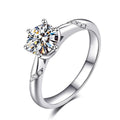 Six-Prong Round Moissanite Leaf Engagement Ring with CZ in white gold-plated S925 sterling silver on clean white background