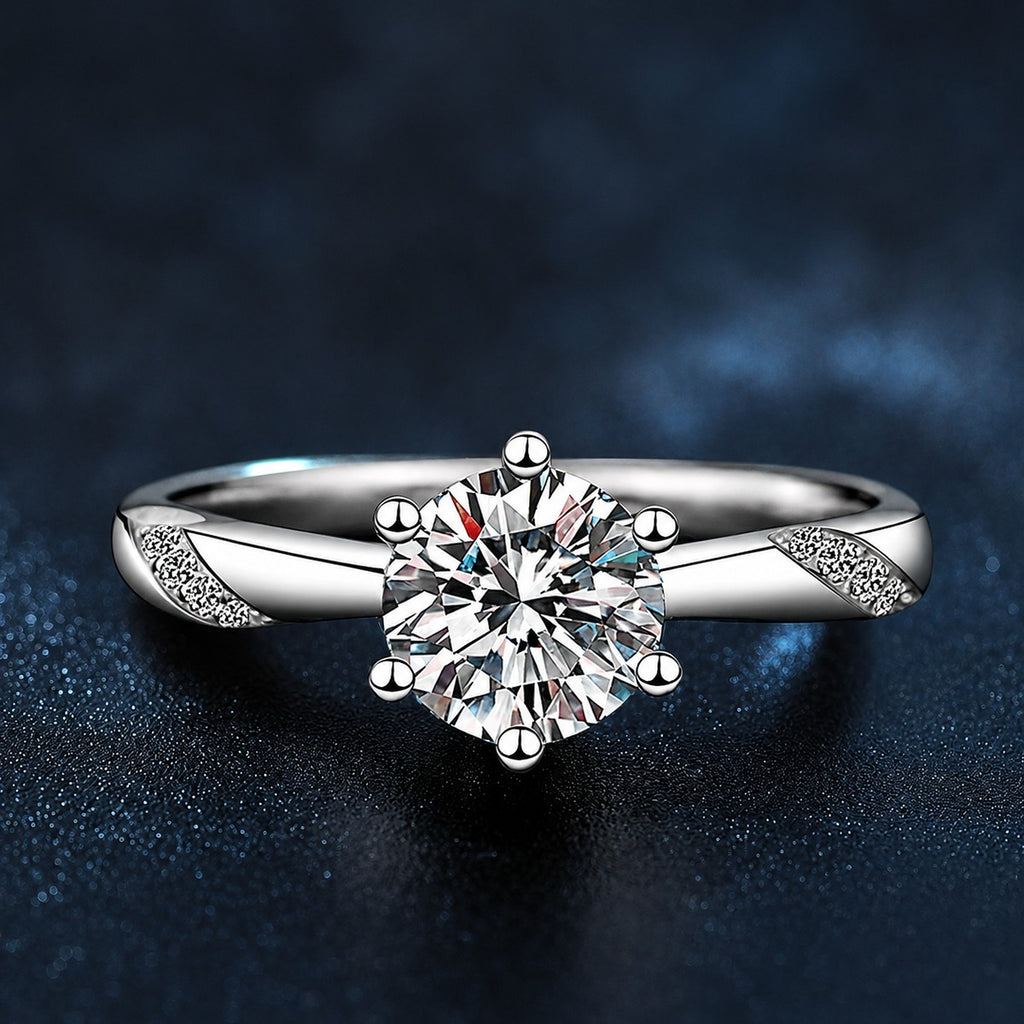 Six-Prong Round Moissanite Leaf Engagement Ring with CZ close-up detail view with moissanite sparkle