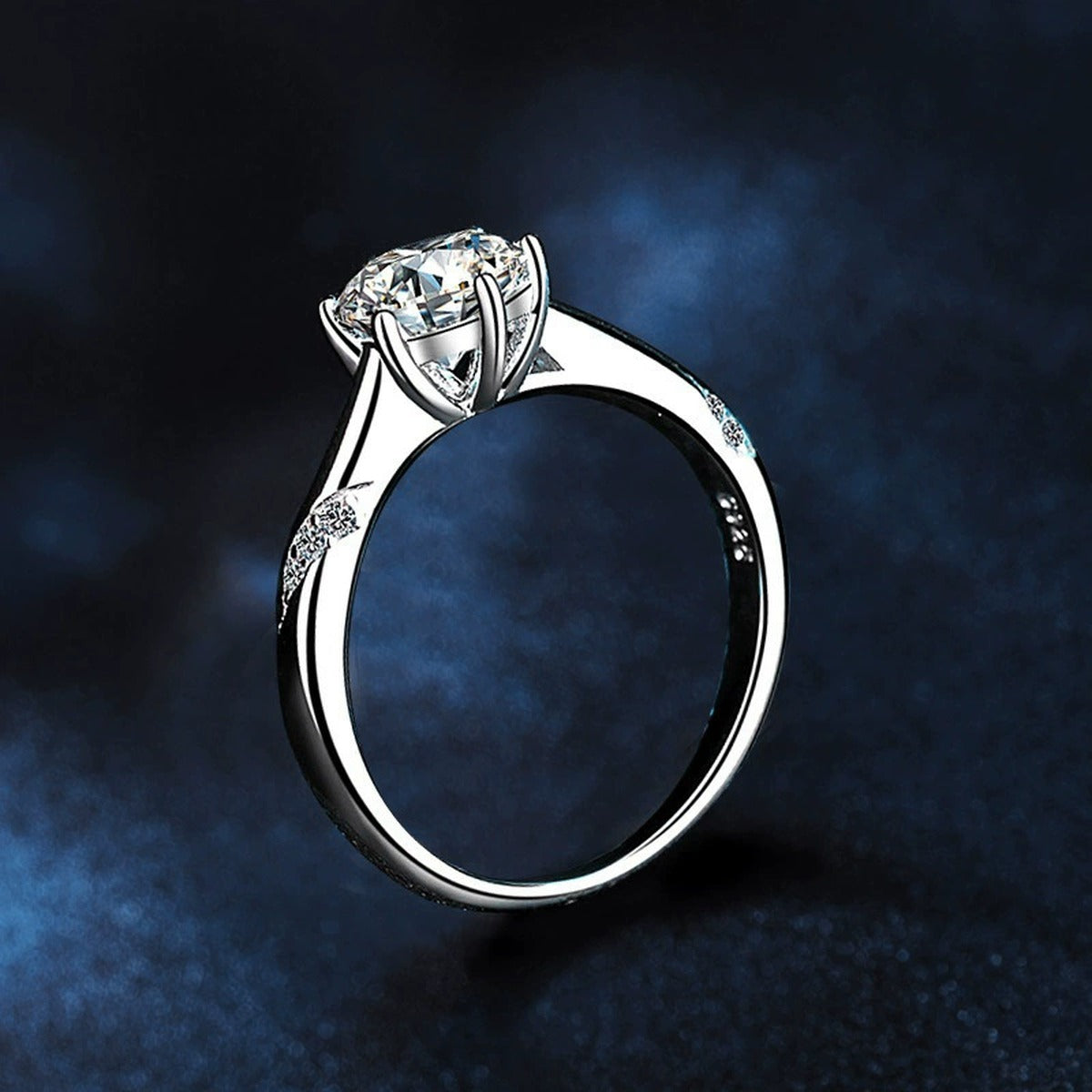 Six-Prong Round Moissanite Leaf Engagement Ring with CZ close-up detail view with moissanite sparkle