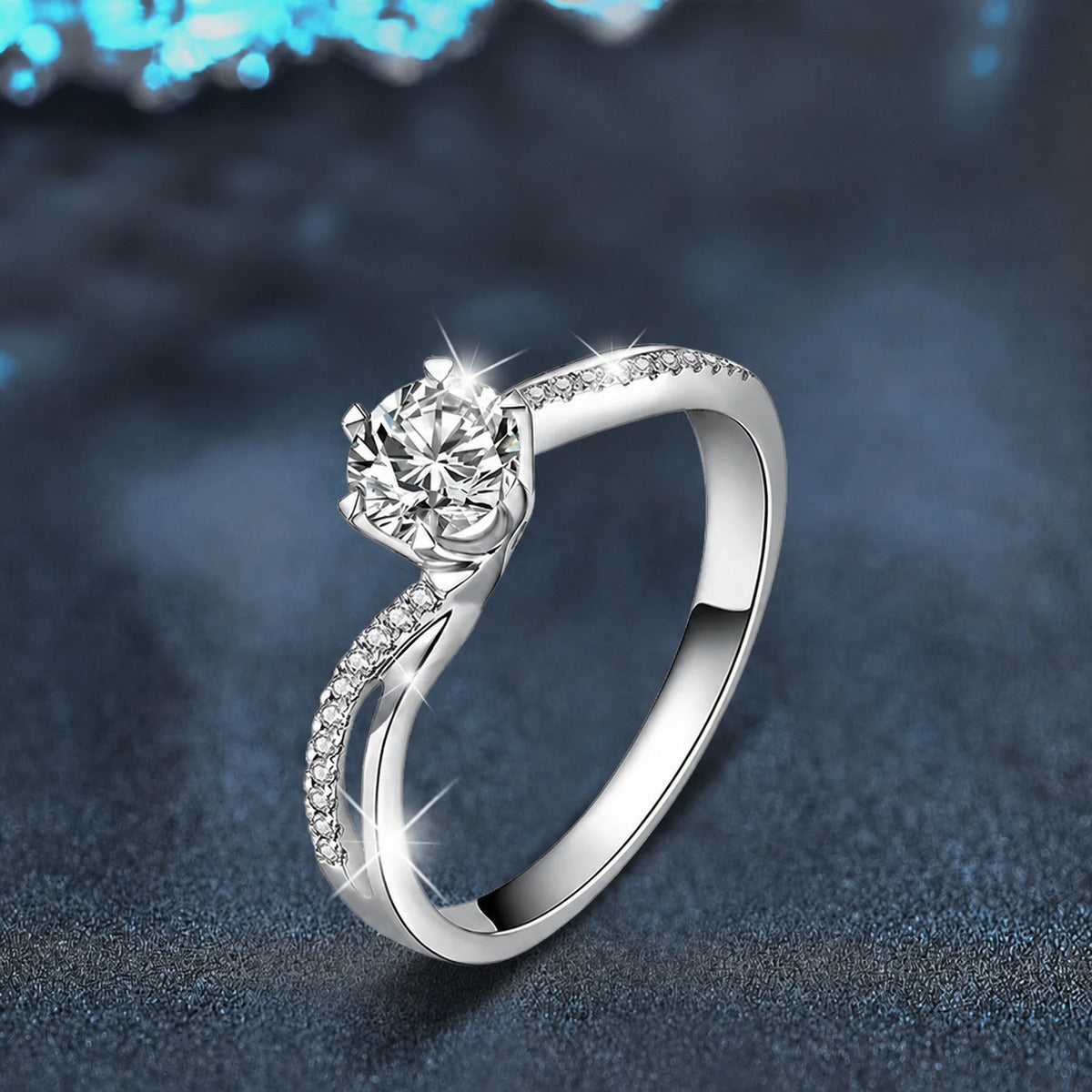 Twist Six-Prong Round Moissanite Engagement Ring with CZ close-up detail view with moissanite sparkle