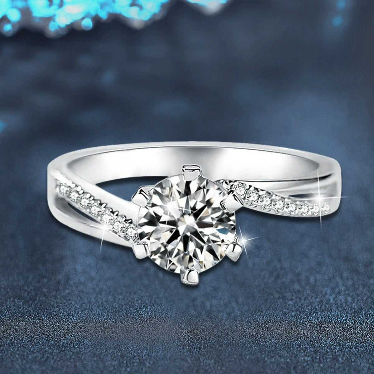 Twist Six-Prong Round Moissanite Engagement Ring with CZ close-up detail view with moissanite sparkle