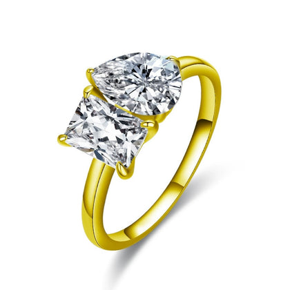 Radiant and Pear Cut Moissanite Toi et Moi Engagement Ring in gold-plated S925 sterling silver on clean white background