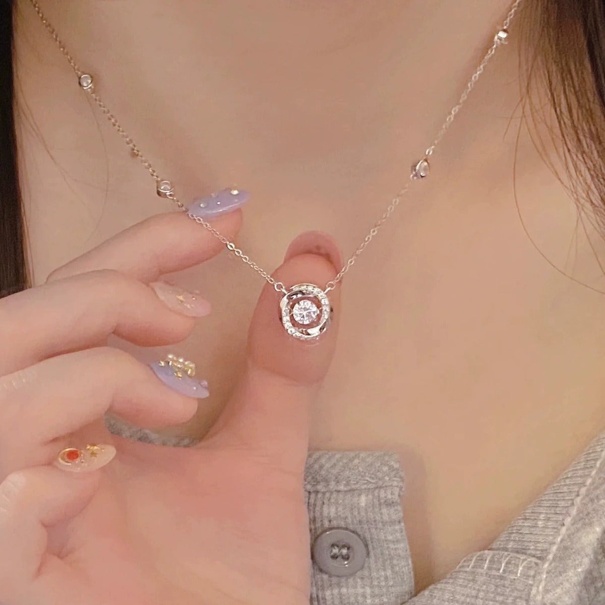 Mobius Round Moissanite Necklace with CZ in White Gold-Plated S925 sterling silver neckline model view showing pendant scale and chain length