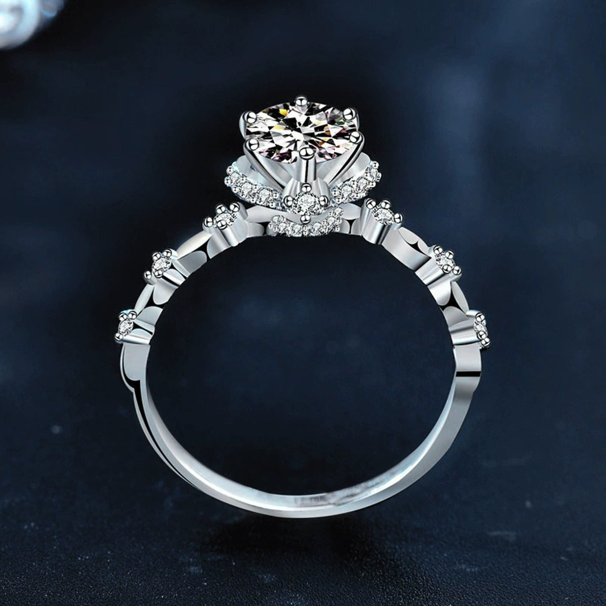 Six-Prong Round Moissanite Engagement Ring with CZ product view showing moissanite setting and metal finish