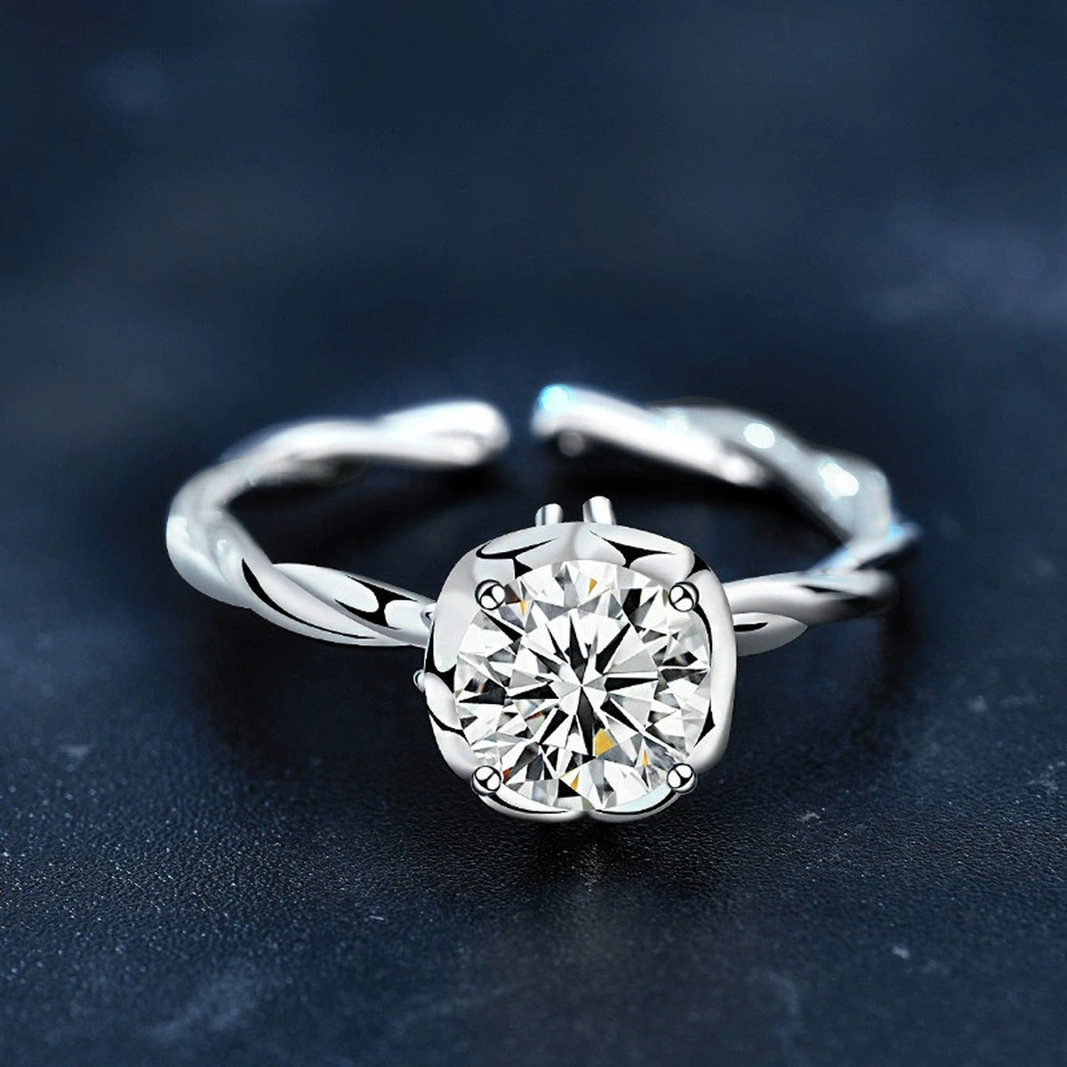 Twist Band Round Moissanite Adjustable Engagement Ring product view showing moissanite setting and metal finish