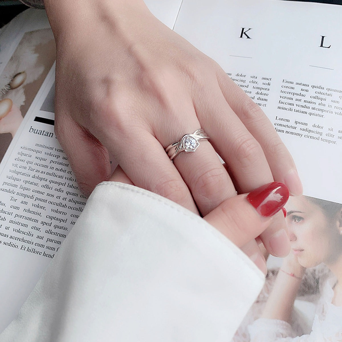 Princess and Knight Couples Round Moissanite Wedding Rings with CZ worn on hand to show scale, band width, and ring profile