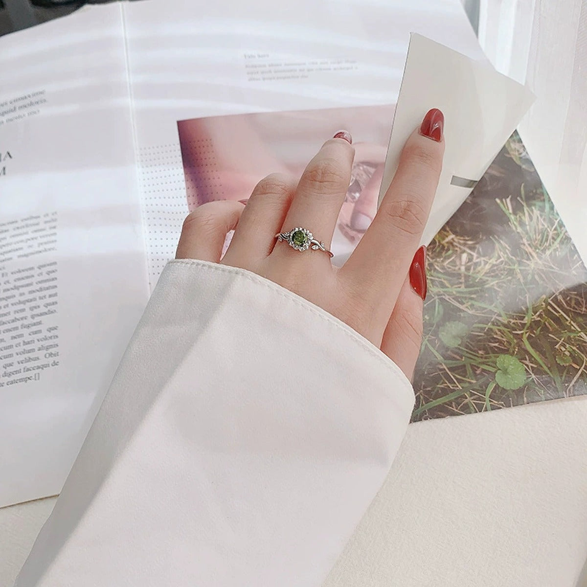 Floral Round Moissanite Adjustable Fashion Ring worn on hand to show scale, band width, and ring profile