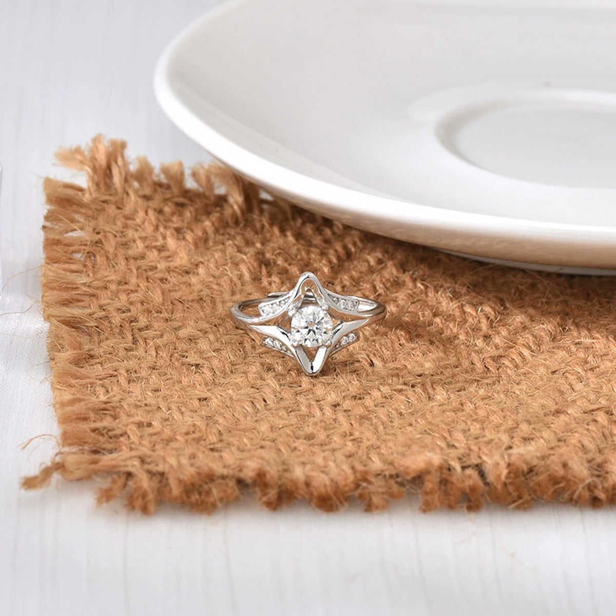 Starburst Round Moissanite Adjustable Engagement Ring with CZ detailed product photo showing ring shape and stone setting