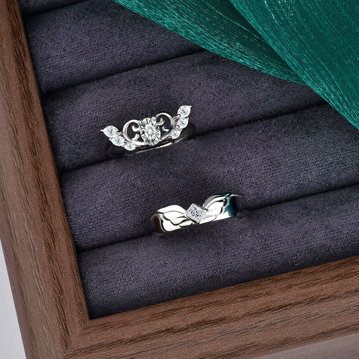 Angel Wing Couples Moissanite Wedding Rings close-up detail view with moissanite sparkle