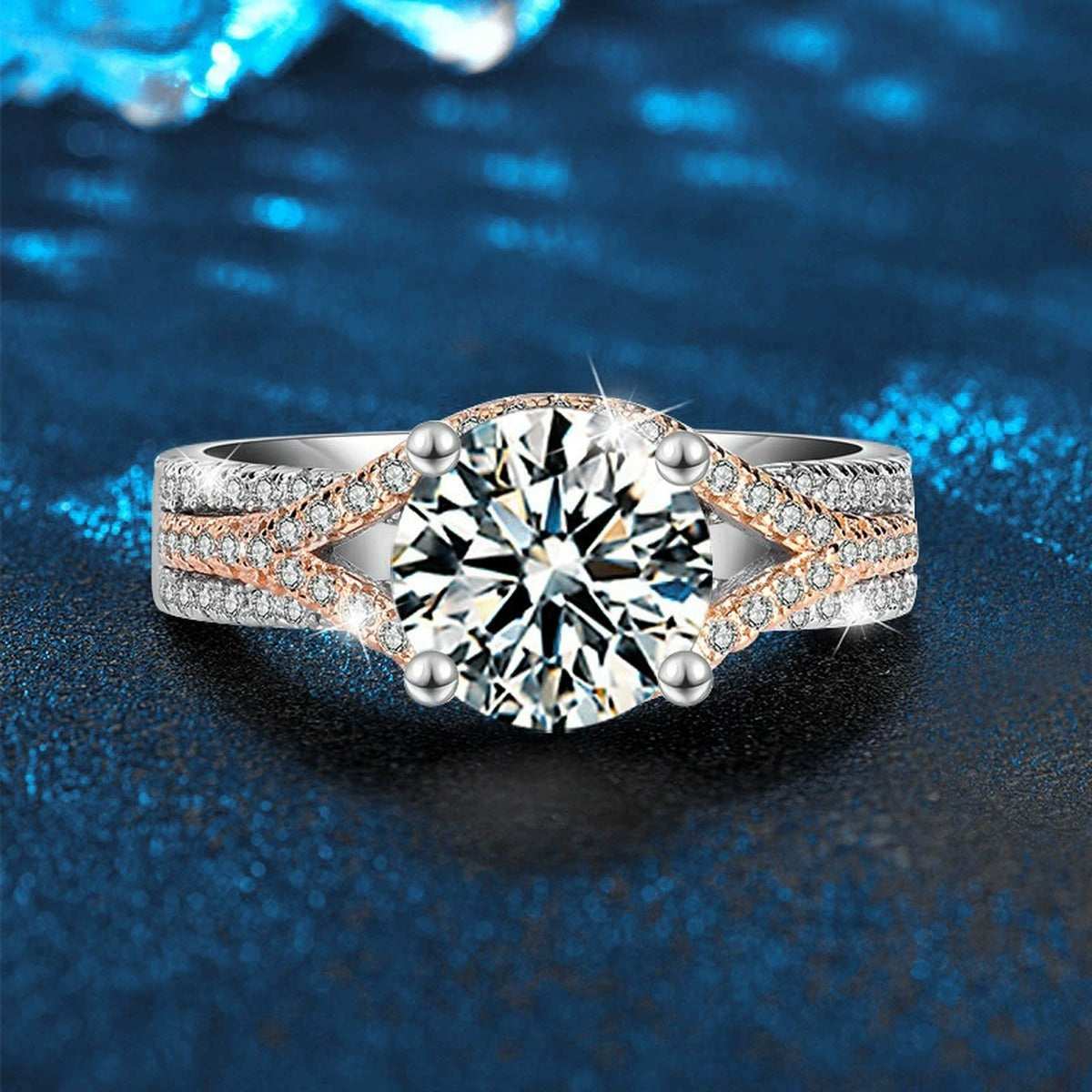 Four-Prong Round Moissanite Engagement Ring with CZ close-up detail view with moissanite sparkle