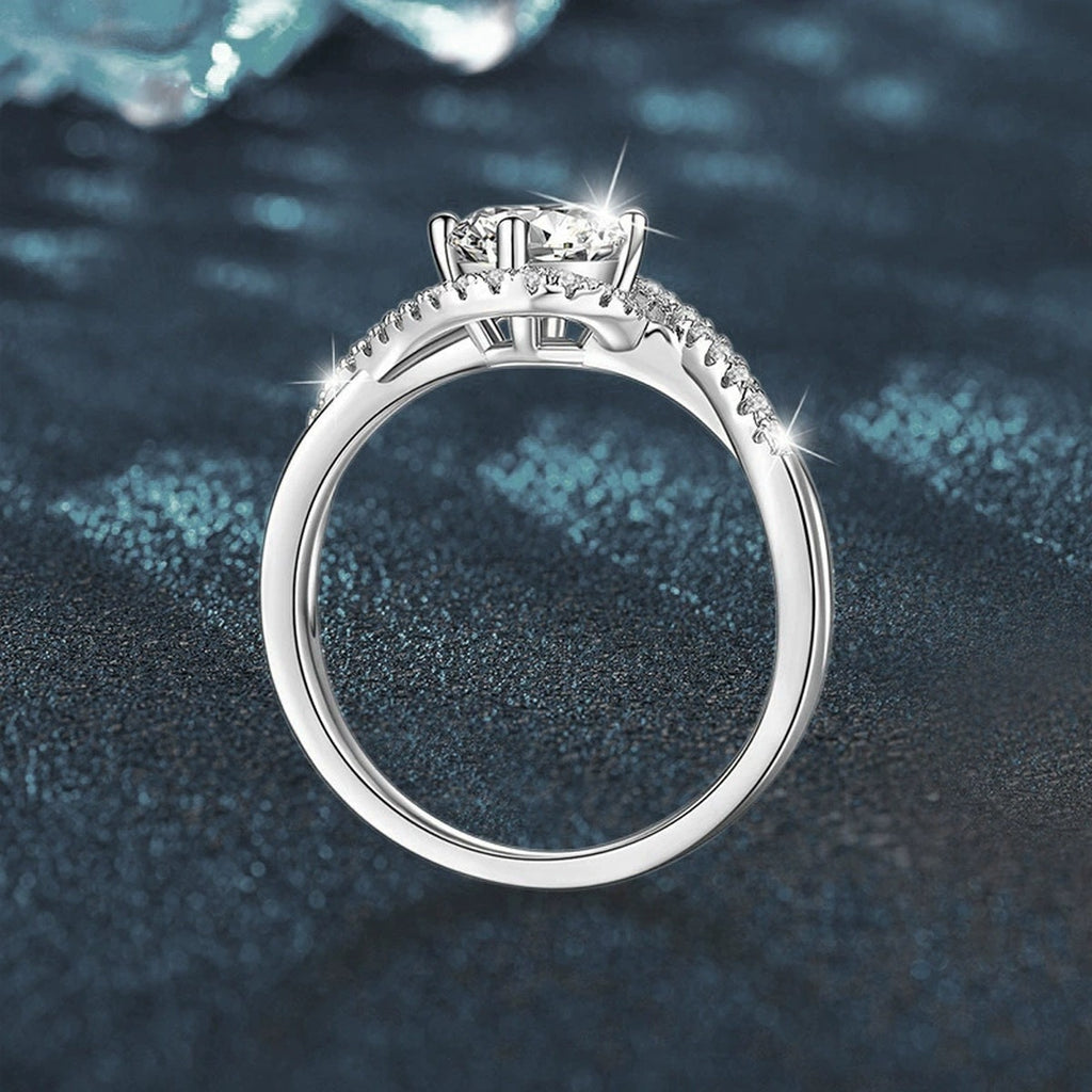 Twist Band Round Moissanite Engagement Ring with CZ close-up detail view with moissanite sparkle