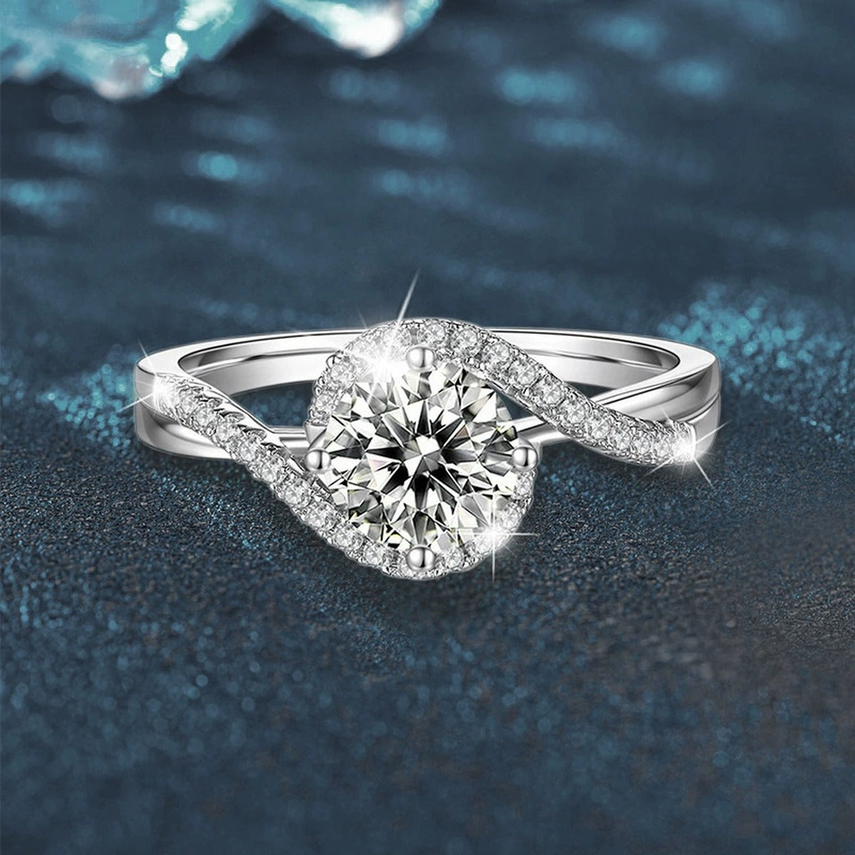 Twist Band Round Moissanite Engagement Ring with CZ close-up detail view with moissanite sparkle