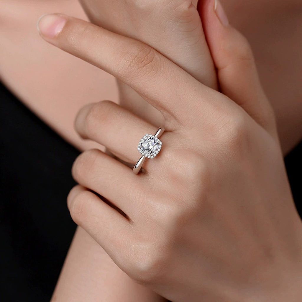 Round Moissanite Adjustable Engagement Ring worn on hand to show scale, band width, and ring profile
