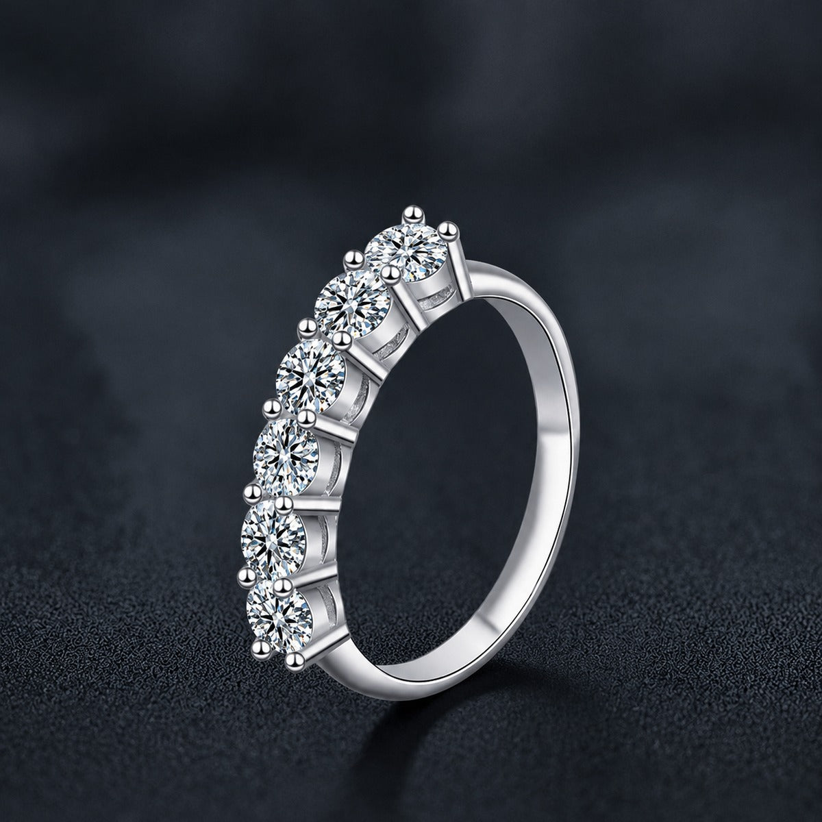 Graduated Round Moissanite Wedding Ring close-up detail view with moissanite sparkle