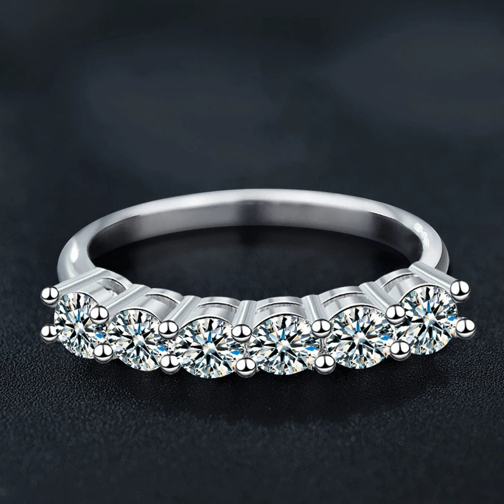 Graduated Round Moissanite Wedding Ring close-up detail view with moissanite sparkle