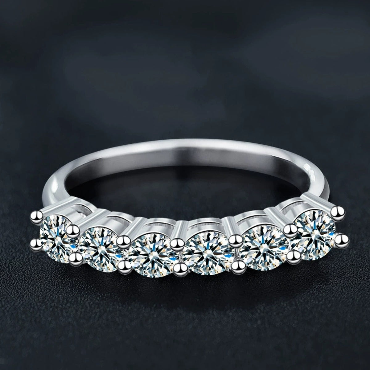 Graduated Round Moissanite Wedding Ring close-up detail view with moissanite sparkle