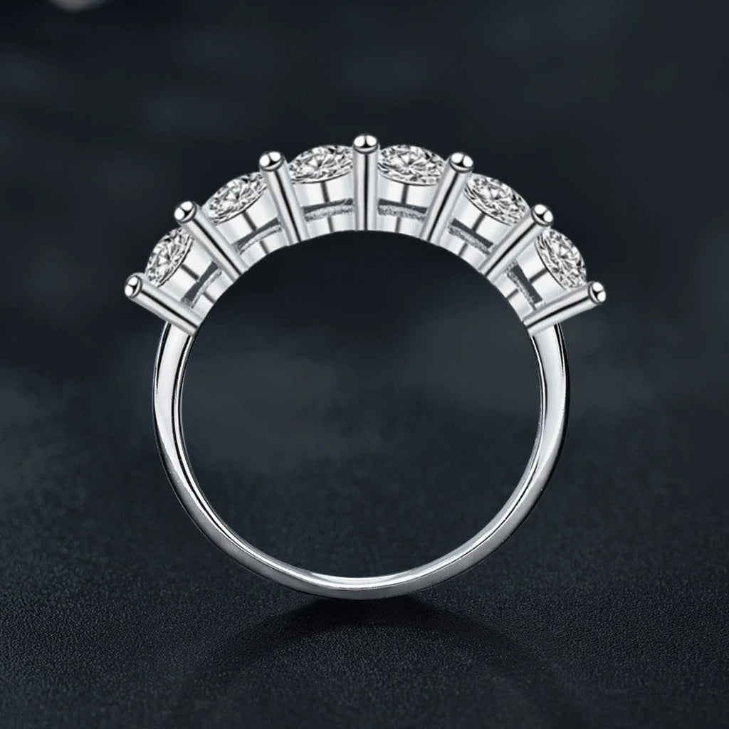 Graduated Round Moissanite Wedding Ring close-up detail view with moissanite sparkle