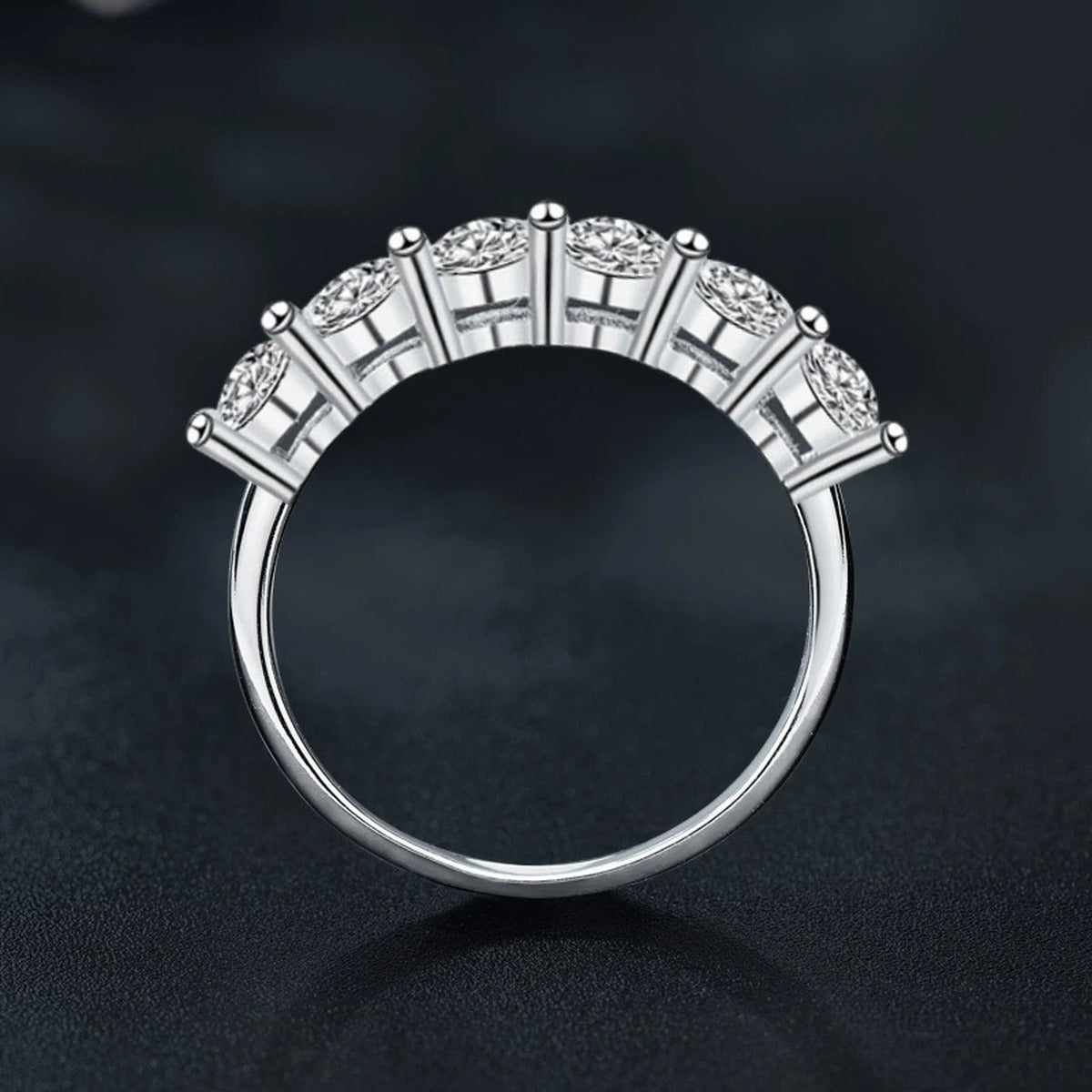 Graduated Round Moissanite Wedding Ring close-up detail view with moissanite sparkle