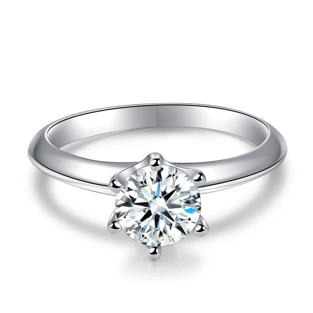 Classic Six-Prong Round Moissanite Solitaire Engagement Ring in white gold-plated S925 sterling silver on clean white background