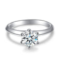 Classic Six-Prong Round Moissanite Solitaire Engagement Ring in white gold-plated S925 sterling silver on clean white background