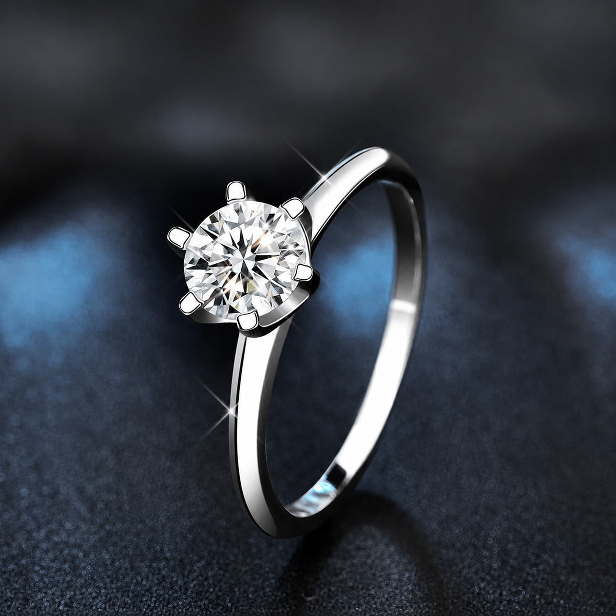 Classic Six-Prong Round Moissanite Solitaire Engagement Ring close-up detail view with moissanite sparkle