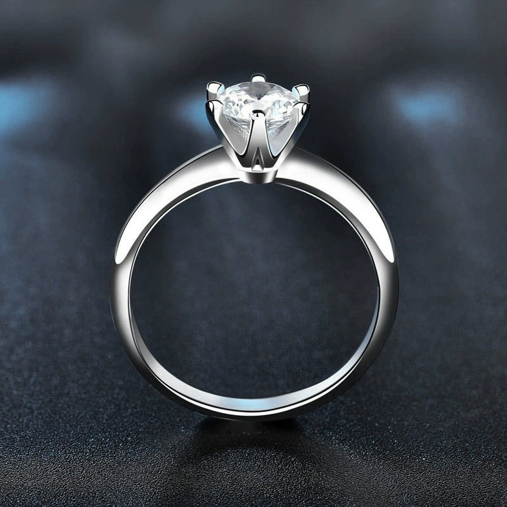 Classic Six-Prong Round Moissanite Solitaire Engagement Ring close-up detail view with moissanite sparkle