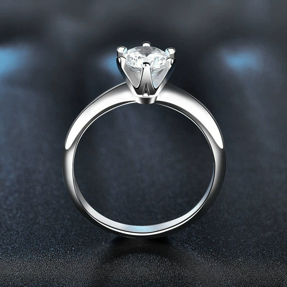 Classic Six-Prong Round Moissanite Solitaire Engagement Ring close-up detail view with moissanite sparkle