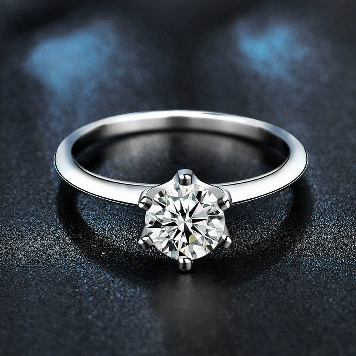 Classic Six-Prong Round Moissanite Solitaire Engagement Ring close-up detail view with moissanite sparkle