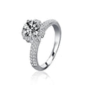 Crown Six-Prong Round Moissanite Engagement Ring with CZ in white gold-plated S925 sterling silver on clean white background