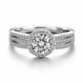 Wide Band Round Moissanite Engagement Ring with CZ in white gold-plated S925 sterling silver on clean white background