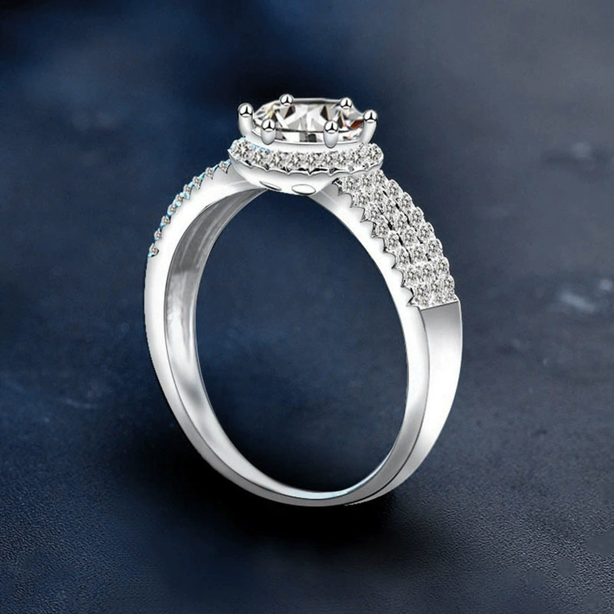 Wide Band Round Moissanite Engagement Ring with CZ close-up detail view with moissanite sparkle