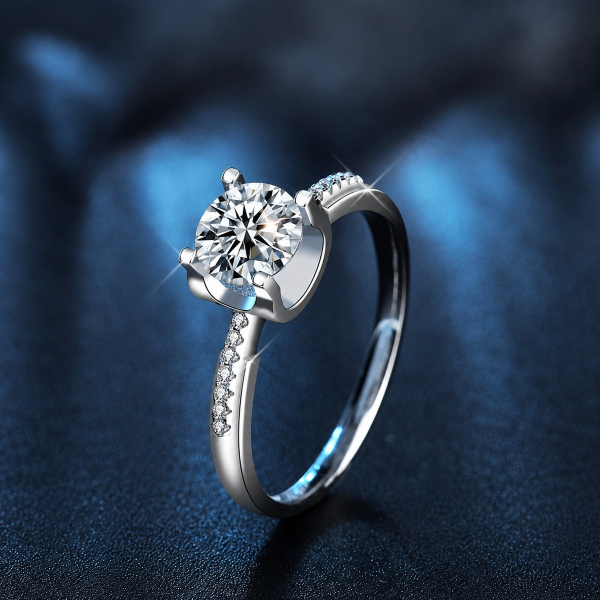 Four-Prong Round Moissanite Engagement Ring with CZ close-up detail view with moissanite sparkle