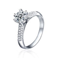 Starburst Round Moissanite Engagement Ring with CZ in white gold-plated S925 sterling silver on clean white background