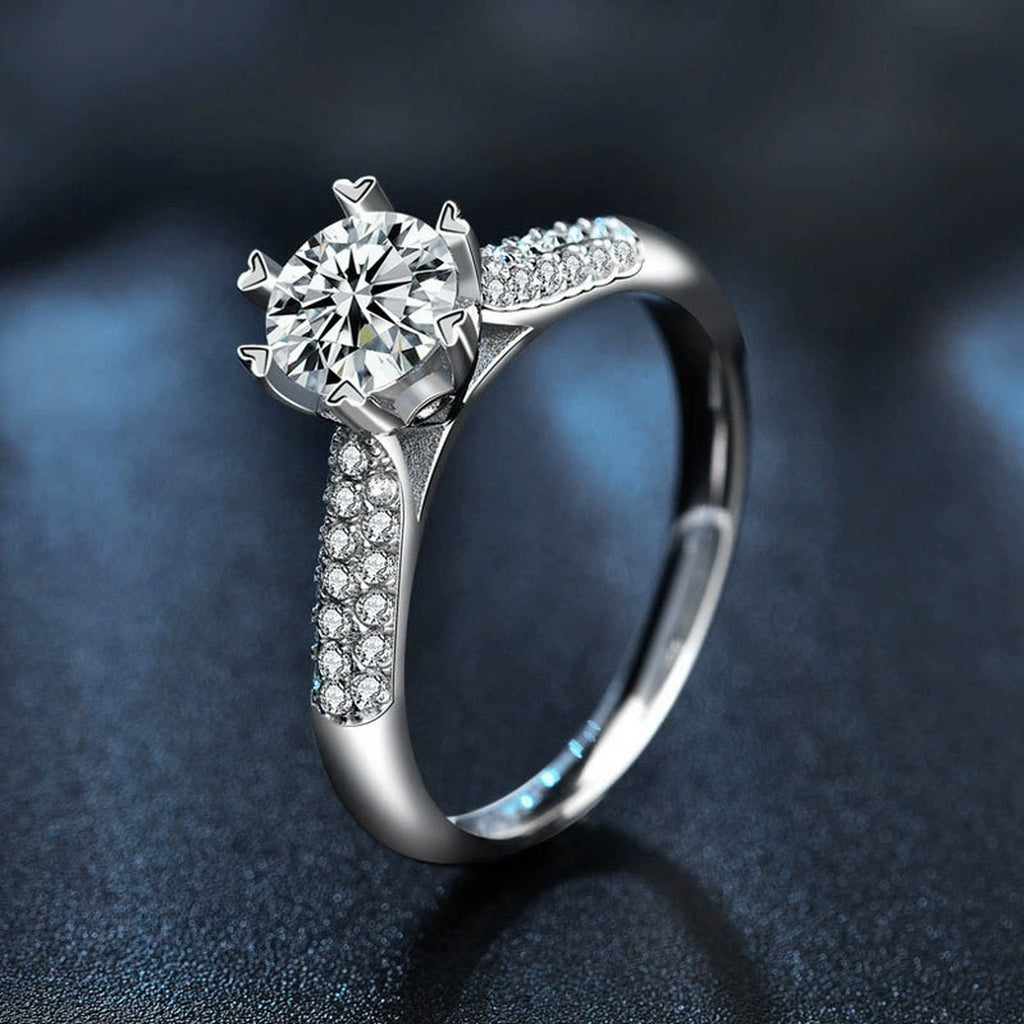 Starburst Round Moissanite Engagement Ring with CZ product view showing moissanite setting and metal finish