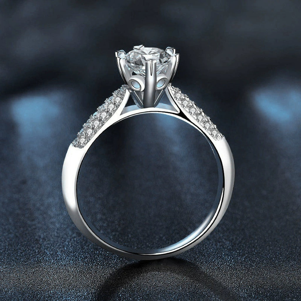 Starburst Round Moissanite Engagement Ring with CZ close-up detail view with moissanite sparkle