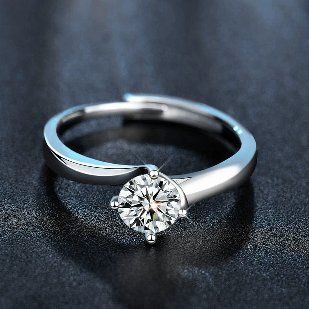 Four-Prong Round Moissanite Adjustable Engagement Ring product view showing moissanite setting and metal finish